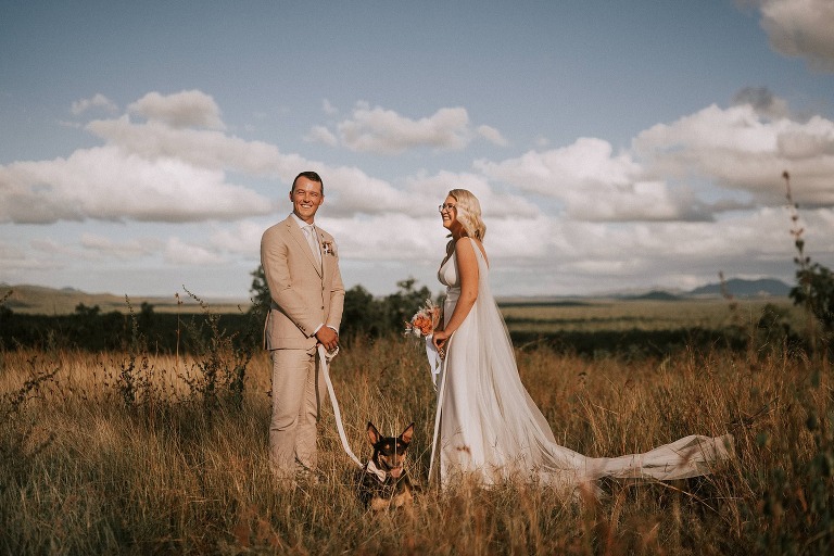 Wedding ceremony in field at Mount Mulligan