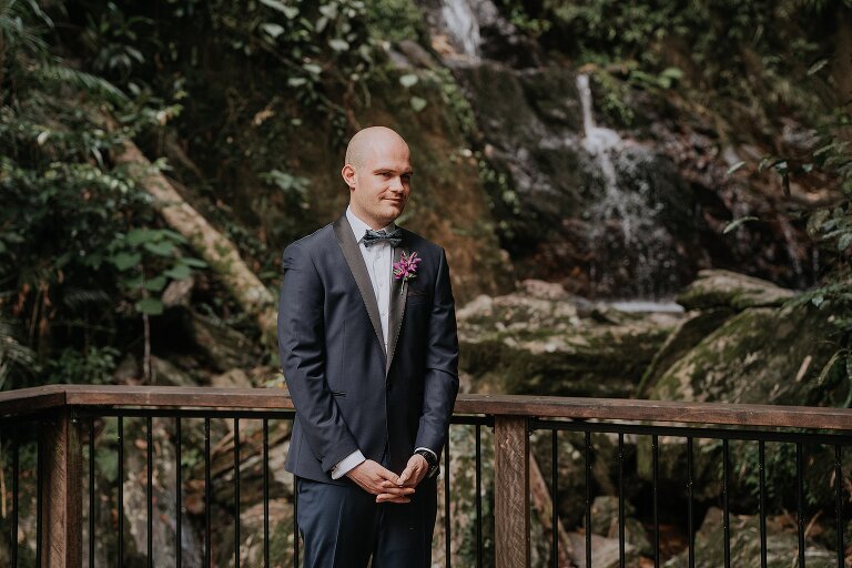 Groom waiting for elopement wedding to begin at Daintree Ecolodge